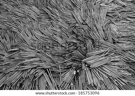 Abstract design of a chaotic structure of metallic nails