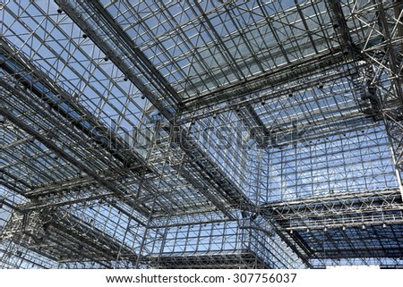 architecture blue glass ceiling inside contemporary business hallway