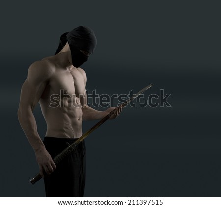 Athletic ninja with katana sword on a dark background