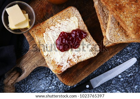 Similar – Image, Stock Photo Homemade toasted bread with fried egg, spinach and aromatic herbs