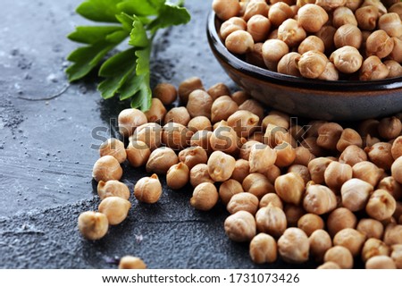 Raw Chickpeas in a bowl. Chickpeas is nutritious food. Healthy and natural vegetarian food Stockfoto © 