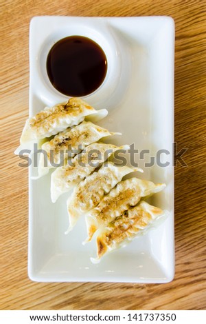 Dim-sum call Gyoza Japanese  food on white plate