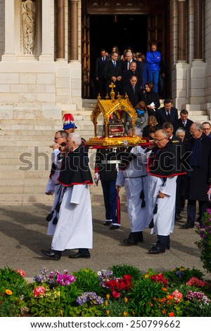 MONACO-VILLE, MONACO - JAN 27, 2015: The relics of Saint Devota are being carried out of the cathedral to the streets, as part of the annual Saint Devota celebration, in Monaco-Ville, Monaco