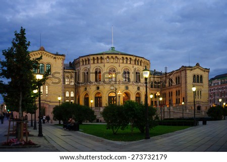 OSLO, NORWAY - SEPTEMBER 26, 2010: The Storting building, the parliament house, with local and tourists, in Oslo, Norway
