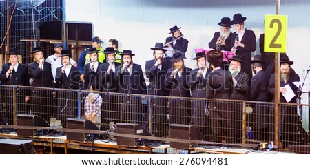 MERON, ISRAEL - MAY 07, 2015: Orthodox Jews play music and sing to the dancing crowd at the annual hillulah of Rabbi Shimon Bar Yochai, in Meron, on Lag BaOmer Holiday