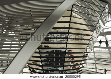 Reichstag Dome, foggy day in Berlin. Interior detail and multiple mirror reflections. Architect by Norman Foster.
