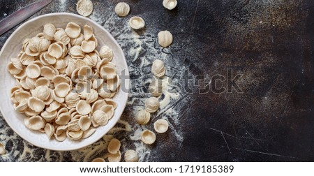 Similar – Image, Stock Photo South italian  pasta orecchiette with tomato sauce and cacioricotta cheese