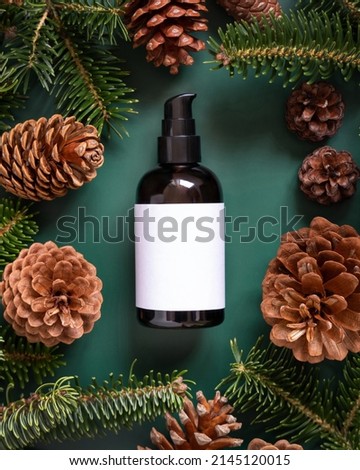 Similar – Image, Stock Photo Brown glass jar near fir branches and pine cones on dark green top view. Brand packaging mockup.