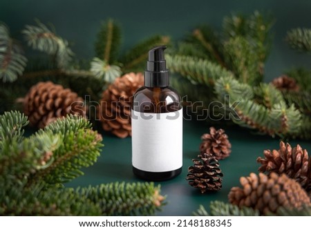 Similar – Image, Stock Photo Brown glass jar near fir branches and pine cones on dark green top view. Brand packaging mockup.