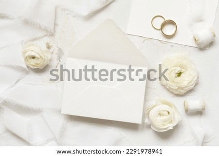 Similar – Image, Stock Photo Blank envelope near pastel pom-poms on light blue top view