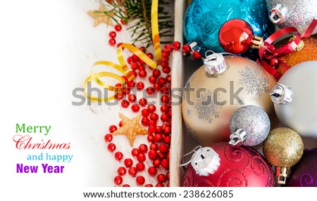Wooden box with colorful Christmas decorations border