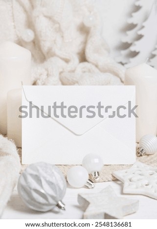 Similar – Image, Stock Photo Blank envelope near pastel pom-poms on light blue top view