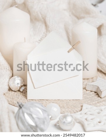 Similar – Image, Stock Photo Blank envelope near pastel pom-poms on light blue top view