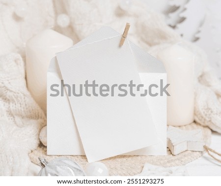 Similar – Image, Stock Photo Blank envelope near pastel pom-poms on light blue top view