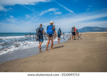 Similar – Image, Stock Photo tourist walking on the street in Bilbao city, Spain