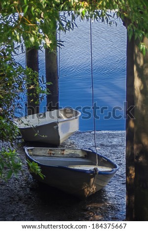Two Rowing Boats on Land, Under A Bridge. Taken in Keri Keri, New Zealand