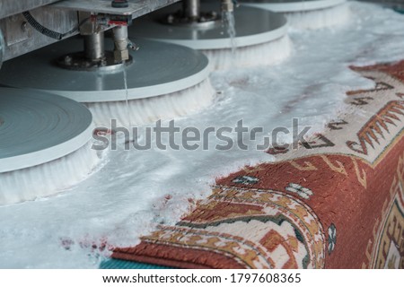 Automatic washing and cleaning of carpets. Industrial line for washing carpets. Carpets chemical cleaning with professionally extraction method and disk machine. Early spring cleaning. 