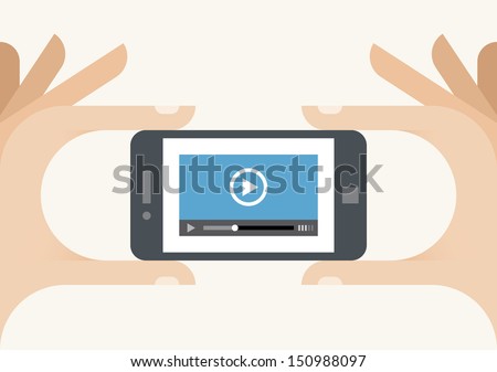 Mobile phone video player on screen in holding human hands. Concepts: movie streaming technologies, services (Youtube, Netflix), home films media collection, video sharing (Instagram, Facebook), TV