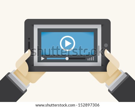 Video movie player on tablet computer in holding human hands. Concepts: streaming technologies, services (Youtube, Netflix), home films media collection, video sharing (Instagram, Facebook), online TV