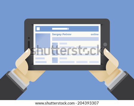 Tablet computer with social network internet page in businessman hands 