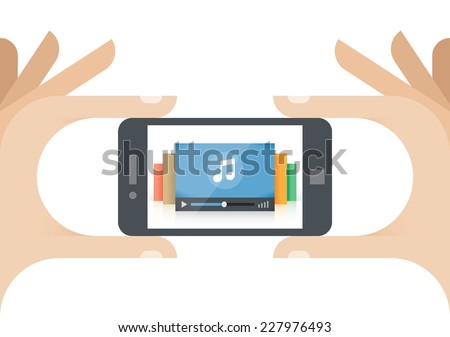 Human hands holding mobile phone with music player on the screen.  Idea - Mobile collection of audio, Cloud computing technologies for internet music listening.