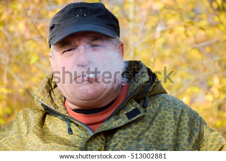 Similar – Image, Stock Photo Adult man smoking cannabis joint