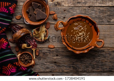 Traditional mexican mole sauce on wooden background Foto stock © 