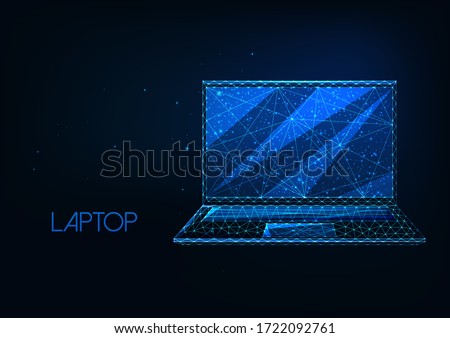 Futuristic glowing low polygonal laptop isolated on dark blue background. Modern wire frame mesh design vector illustration. 