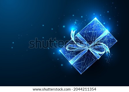 Christmas glowing gift box with ribbon bow  and stars isolated on dark blue background. Abstract present for holidays. Futuristic modern neon line design vector illustration.