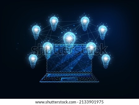 Futuristic creative work ideas concept with glowing network of connected lightbulbs and laptop