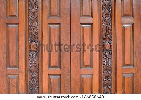 The doors are made from teak wood paint coating.