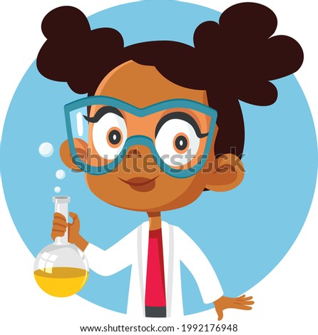 African Student Girl Taking a Science Chemistry Class. Schoolgirl doing a scientific experiment with a chemical solution.

