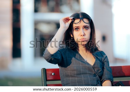 Shocked Young Woman Taking her Glasses Off
Concerned businesswoman feeling flabbergasted by unexpected events
 Stock foto © 