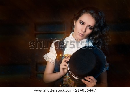 Steampunk Girl with Top Hat and Aviator Glasses - Portrait of a young woman wearing a steampunk outfit with top hat and aviator glasses