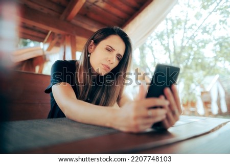 
Woman Squinting Trying to Read Small Text on her Phone
Lady suffering from presbyopia aging vision problems 
 Stok fotoğraf © 