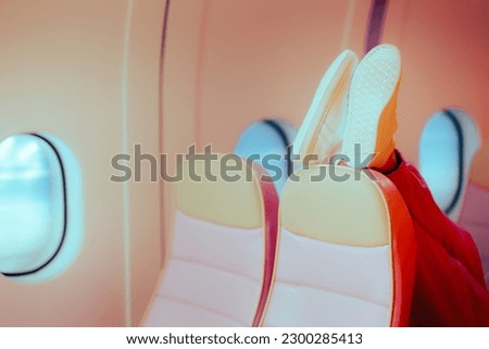 Similar – Image, Stock Photo Airplane seats with more leg space for comfortable flight.