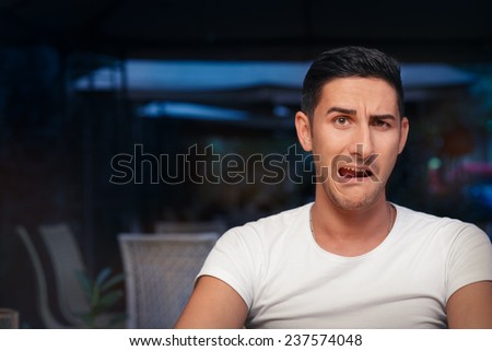 Funny Expressive Man Screaming Desperate - Portrait of a handsome man a making comic face