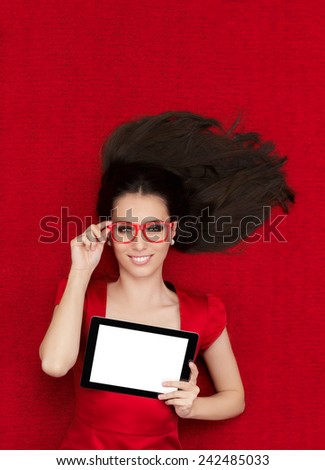 Happy Woman Wearing Glasses Holding Tablet - Beautiful smiling woman in red decor holding a tablet PC