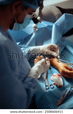 Similar – Image, Stock Photo Medical staff performing surgery in modern clinic