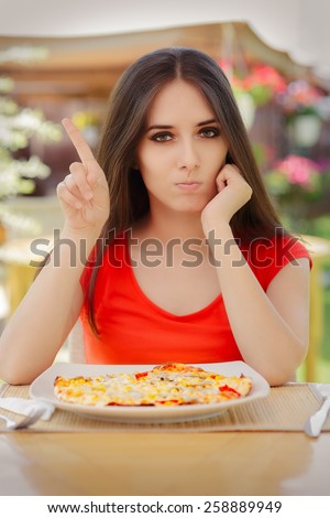 Young Woman Refusing  To Eat a Pizza - Beautiful girl saying no to fast food