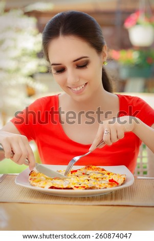 Happy Young Woman Eating Pizza - Beautiful girl eating pizza in a restaurant