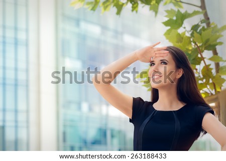 Young Businesswoman Looking Up  and Searching for Something - Elegant woman in central urban decor looking forward for the future