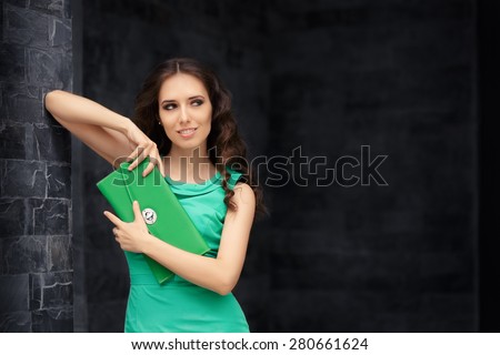 Beautiful Elegant Woman Holding her Purse - Stylish business woman in green pencil dress with matching envelope bag