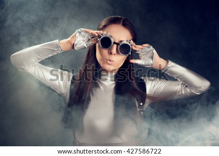 stock-photo-surprised-woman-in-silver-co