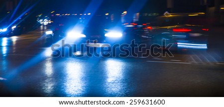 car lights on highway by night,abstract light trace background