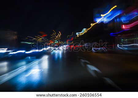 car lights on highway by night,abstract light trace background