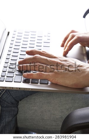 business woman hands busy using laptop at office desk,woman typing on the laptop ,office space , office background
