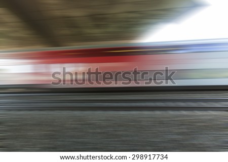 fast train passing by,speed motion blur background,fast train traveling at high speed