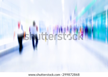Busy crowd of people walking in metro station, Business People Walking on the Street, blurred motion,rush hour in the city