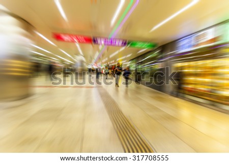 abstract image of people in the metro station,motion blurred people